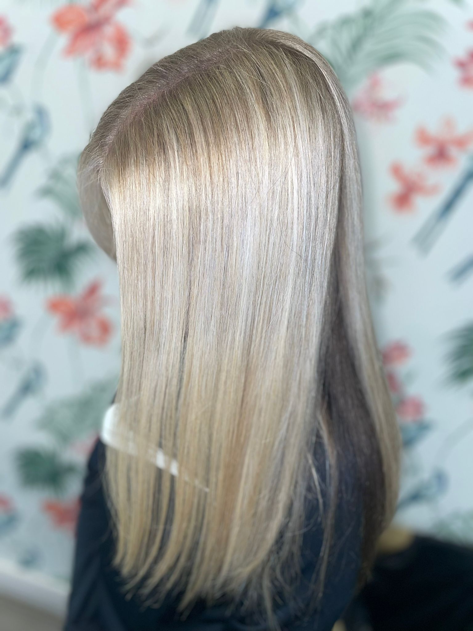 two tone hair blonde refresh on top dark peekaboo underneath
